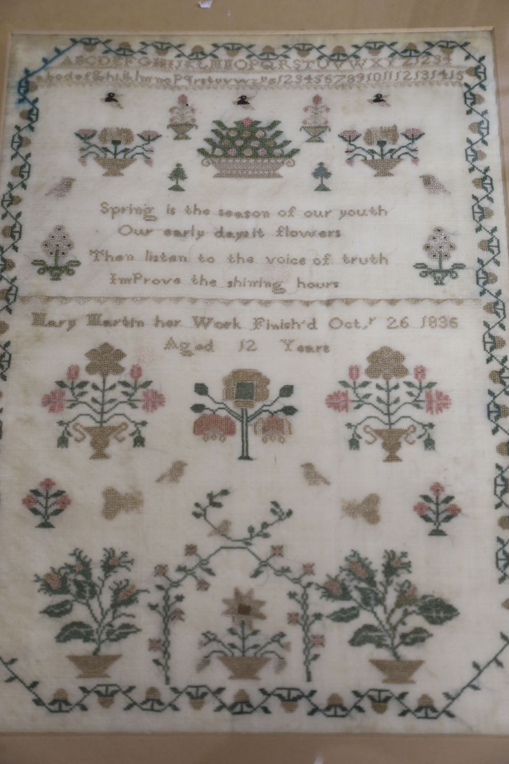 An 1836 cross-stitch sampler, a petite point picture and a Regency silk work picture (3)